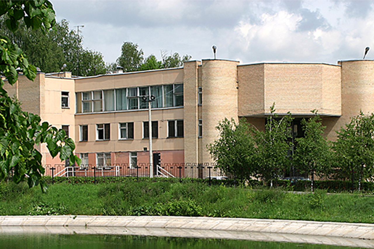 Large, yellow brick building
